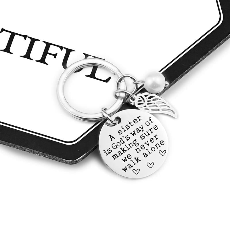 A Sister is God's Way of Making Sure We Never Walk Alone Keychain