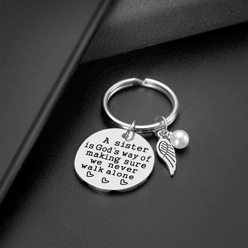A Sister is God's Way of Making Sure We Never Walk Alone Keychain
